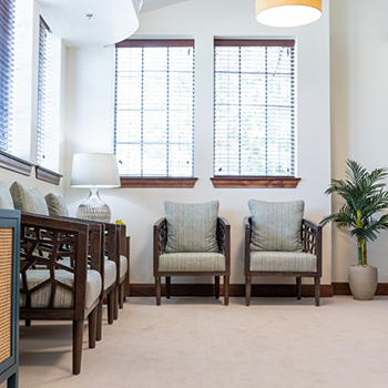 Empty chairs in dental office waiting room