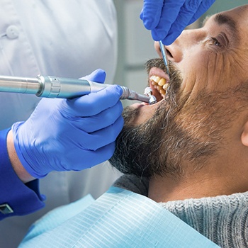 a man having a professional dental cleaning