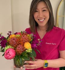 Woman holding some flowers