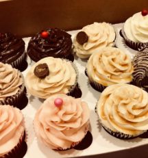 Close up of tray full of cupcakes