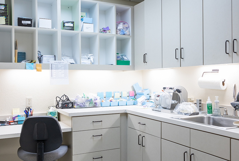 Cabinets and counters with many dental items