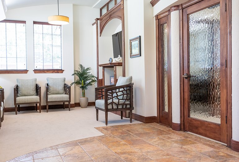 Glass door and empty waiting room
