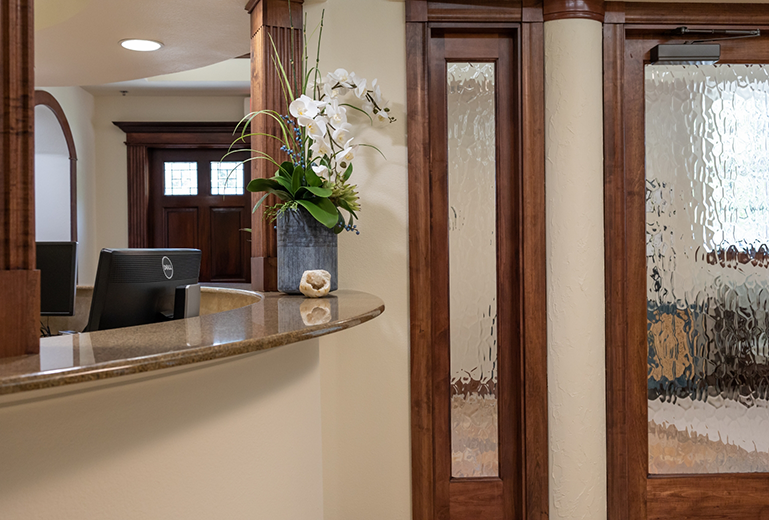 Front desk and doors with glass windows