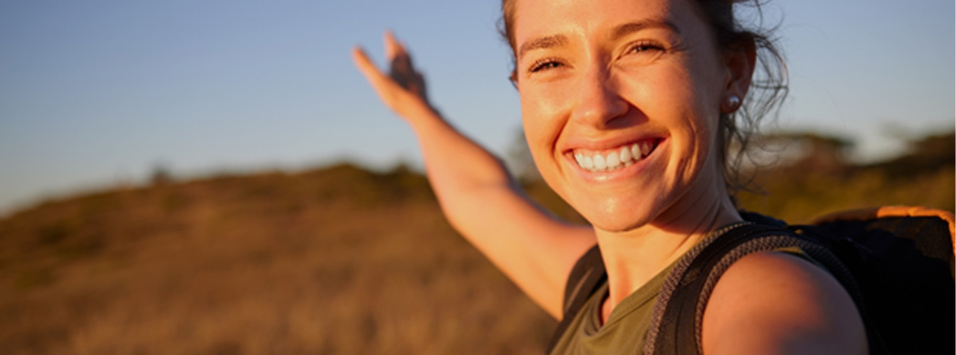 Smiling woman enjoying the outdoors