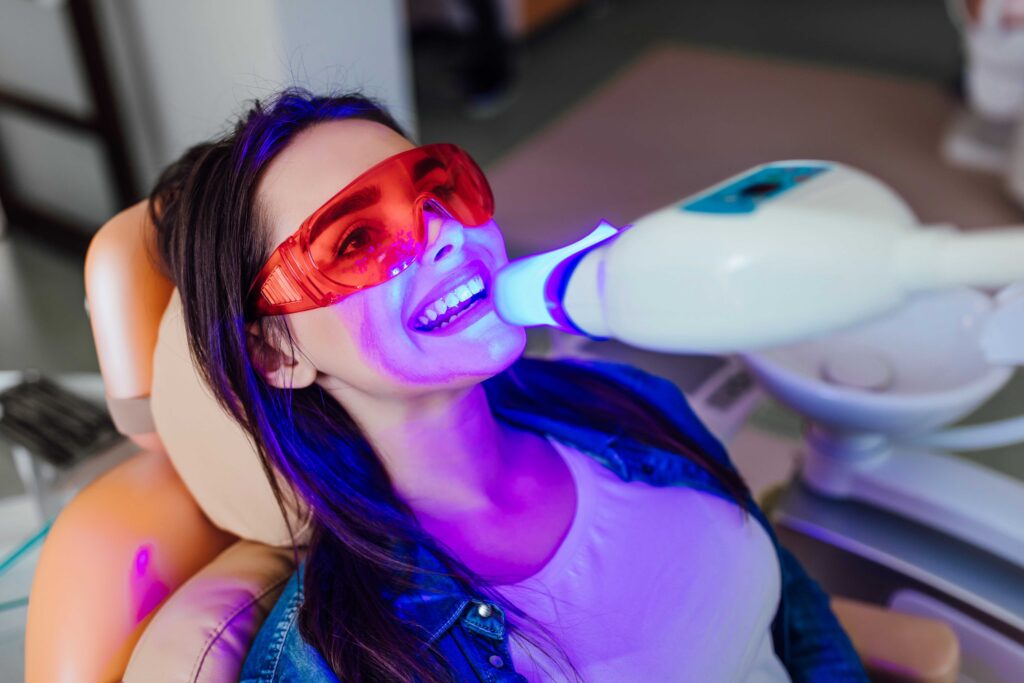 Woman getting her teeth whitened